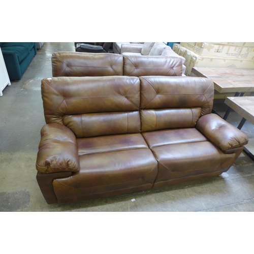 1564 - A pair of Maximus tan leather three seater sofas