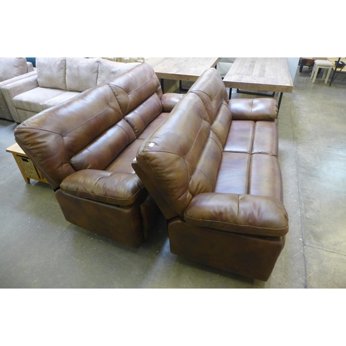 1564 - A pair of Maximus tan leather three seater sofas