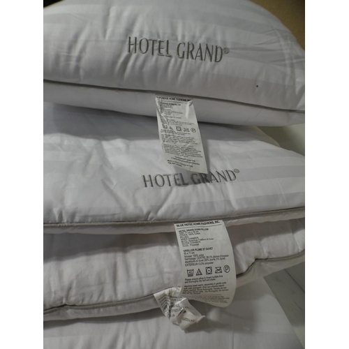 3235 - Four Hotel Grand Down Roll Jumbo Pillows - (231-105) * This lot is subject to VAT