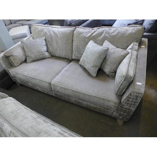 1586 - A copper and silver velvet three seater sofa