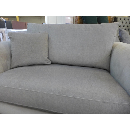 1590 - A taupe upholstered two seater sofa on a timber frame