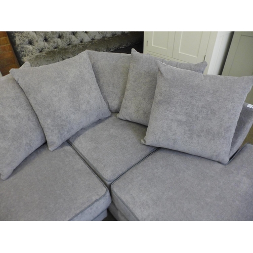 1591 - A grey upholstered small corner sofa