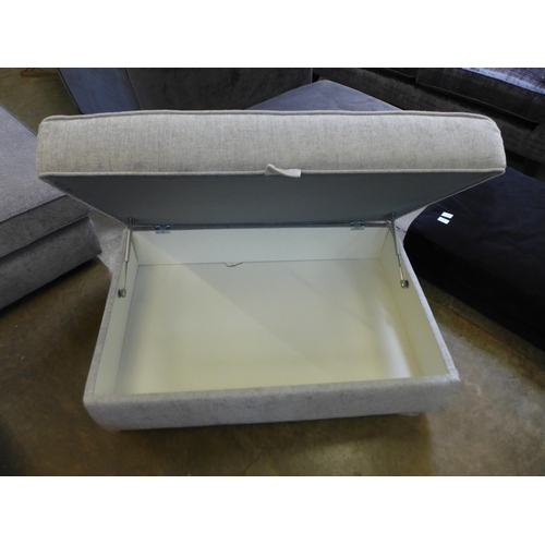 1592 - A grey upholstered storage footstool