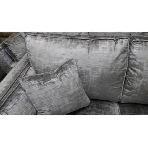 1594 - A silver and pewter velvet two seater sofa