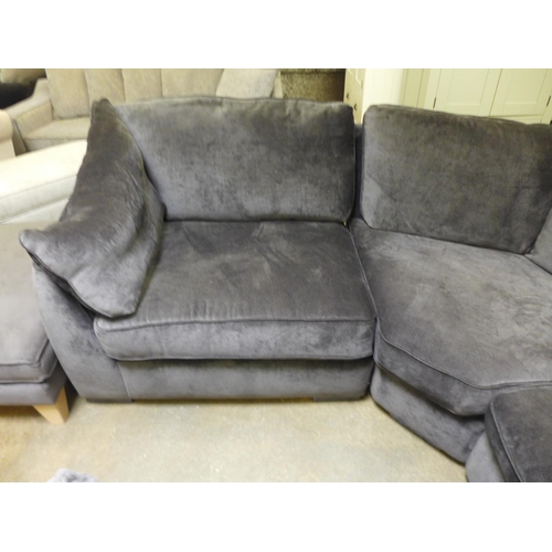 1596 - A charcoal upholstered corner sofa