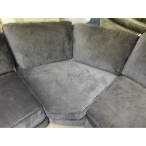 1596 - A charcoal upholstered corner sofa