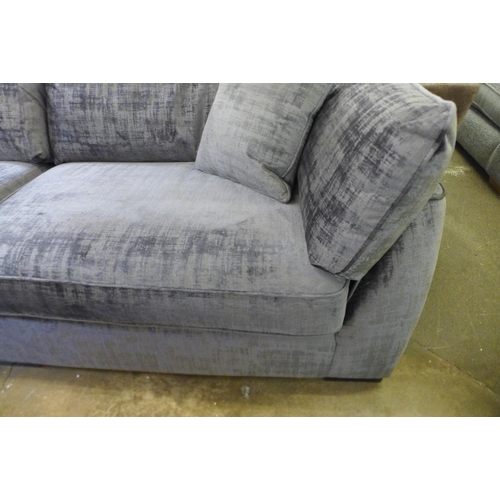 1604 - A silver and pewter velvet four seater sofa