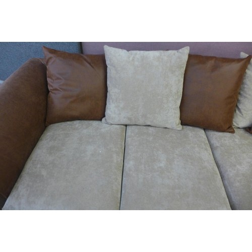 1698 - A brown and beige small corner sofa