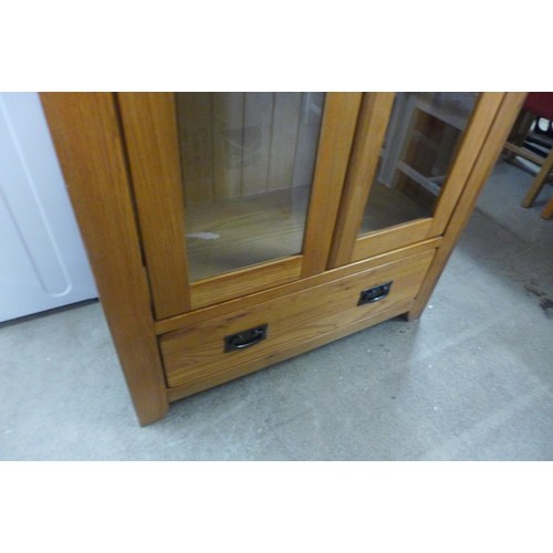 1787 - An oak two door display cabinet