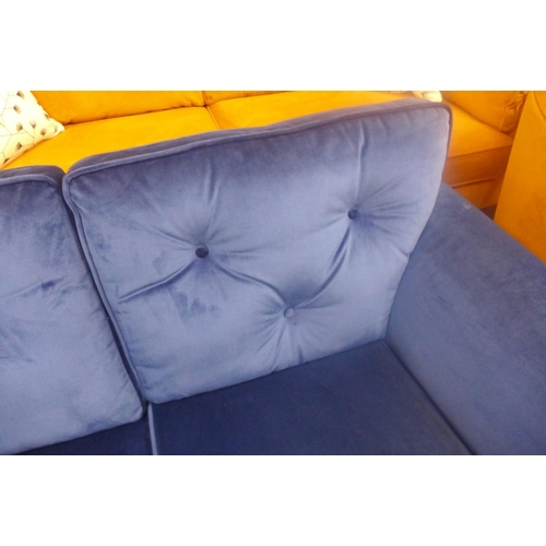 1611 - A royal blue velvet two seater sofa