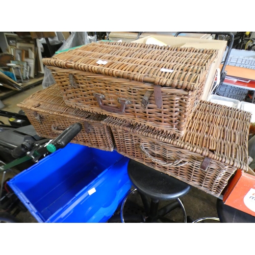 2353 - 3 Wicker picnic baskets, 1 contains unused picnic plates, glasses & cutlery