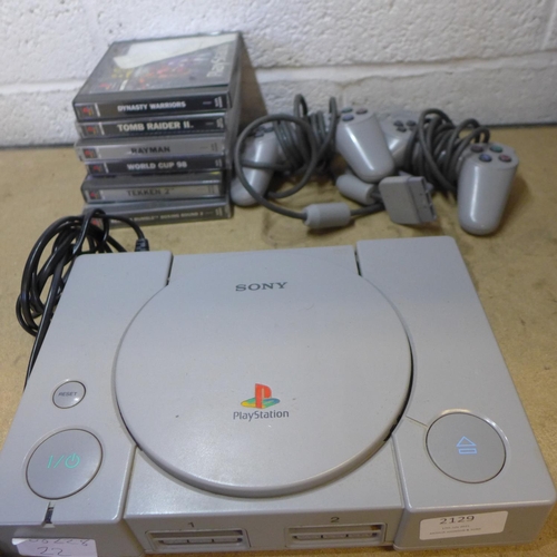 2129 - Playstation One console with qty. of games