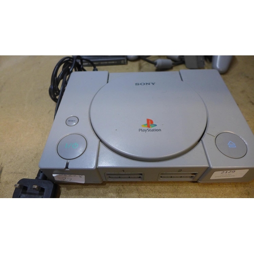 2129 - Playstation One console with qty. of games