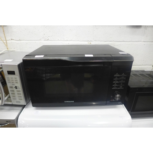 2218 - Samsung 900w microwave - powers on, ideal practise amps