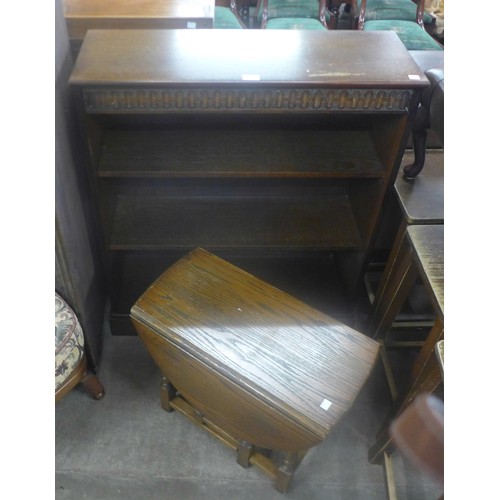 184 - An oak open bookcase and a small drop leaf occasional table