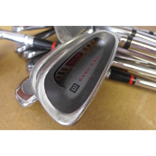 2097 - Set of Wilson deep red golf irons (3-PW) & set of Cobra Greg Norman golf irons (3-PW)