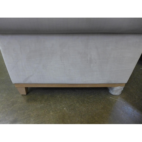 1397 - A taupe upholstered two seater sofa on a timber frame