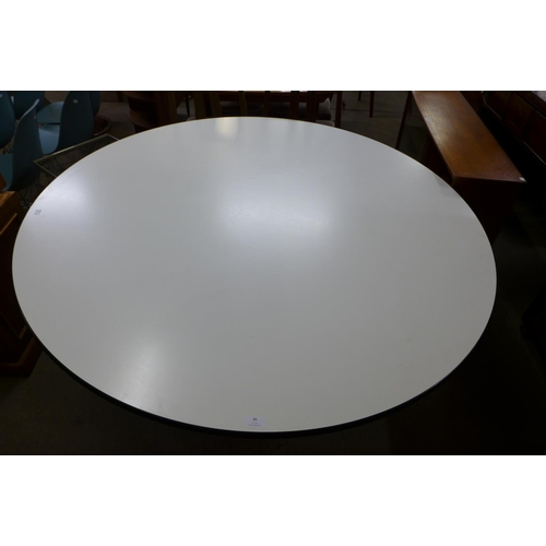 86 - A Charles & Ray Eames chrome and white laminated circular Vitra dining table