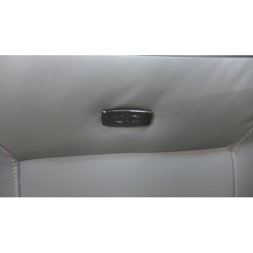 1550 - A Raffa grey leather electric reclining four seater sofa
