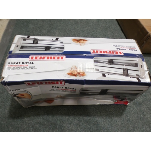 3107 - Two Leifeit wall-mounted plastic wrap dispensers and a Luminarc plate set * This lot is subject to V... 