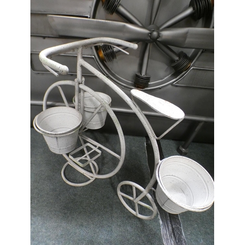 3163 - Penny farthing metal three pot planter * This lot is subject to VAT