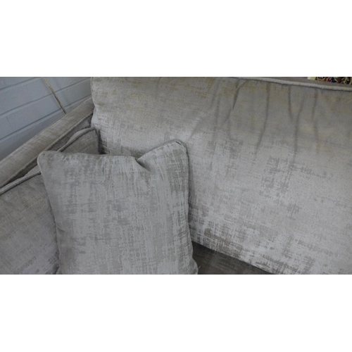 1567 - A copper and silver velvet three seater