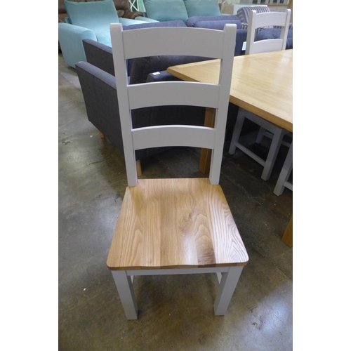 1583 - A rustic oak 1.6m butterfly extending table with six dining chairs (NC-16BET-OAK) * This lot is subj... 