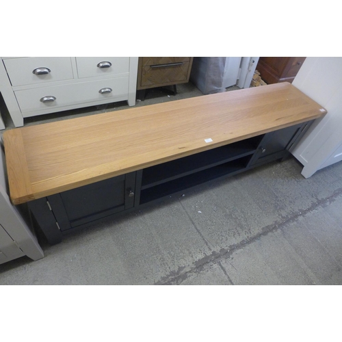 1323 - A Hampshire blue painted oak extra large TV unit ( marks to front and sides)(KEL P32-73)  *This lot ... 