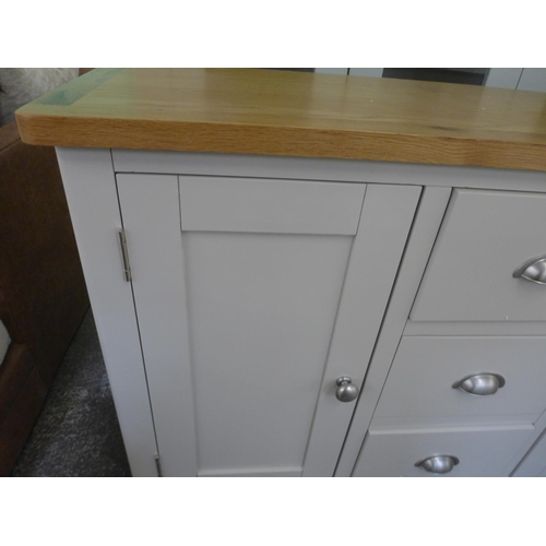 1333 - A Suffolk grey painted oak two door mini sideboard marked top and inside(TT-SMS-G) * This lot is sub... 