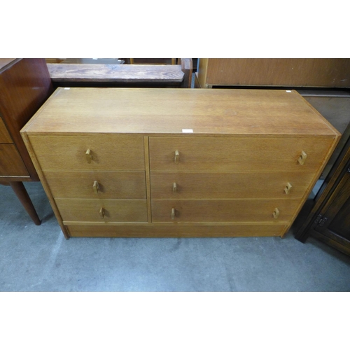 63 - A Stag oak Cantata chest of drawers