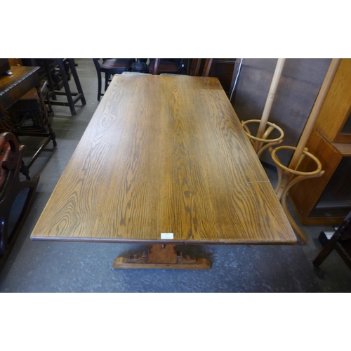 156 - An oak refectory table