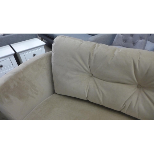 1390 - A caramel velvet two seater sofa