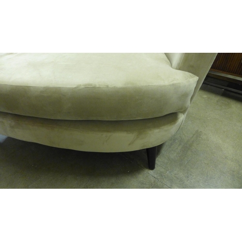 1390 - A caramel velvet two seater sofa