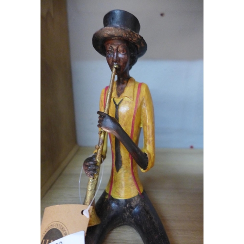 1402 - A sitting jazz band trumpeter, 39cms (026109)   #