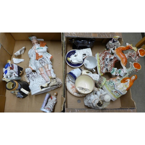 1193 - 19th Century Staffordshire pottery; flatback figures, spill holders, moustache cups and saucers, etc... 