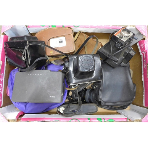 1195 - A collection of cameras including Polaroid, Zenith, Kodak, etc. **PLEASE NOTE THIS LOT IS NOT ELIGIB... 