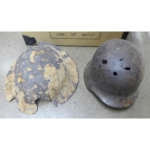 1197 - Two WWI helmets, (battlefield finds) two fuel cans, a/f, fireman's helmet, etc. **PLEASE NOTE THIS L... 