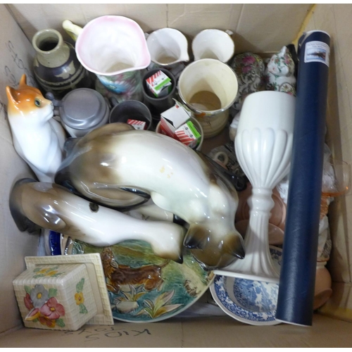 1199 - A box of mixed china including an Art Deco jug, majolica hunting plate, two figures of cats, etc. **... 