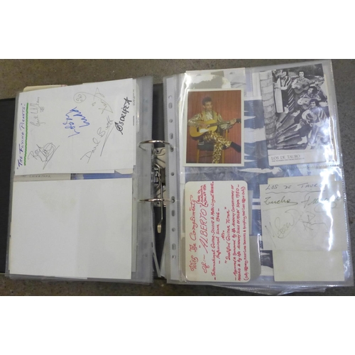 675 - An album of 1950's and 1960's autographs, some from bands before they were famous, approximately 100... 