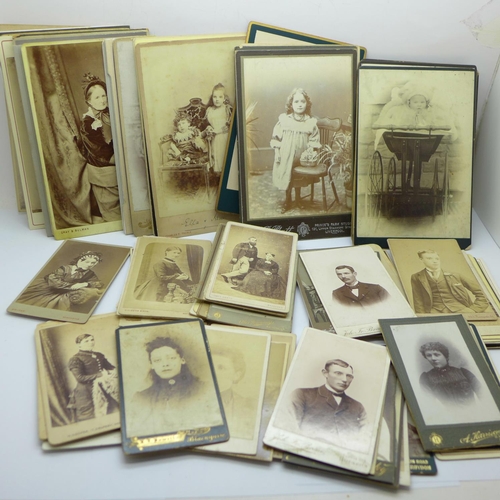 676 - A collection of over 100 Victorian cabinet cards and CDV's