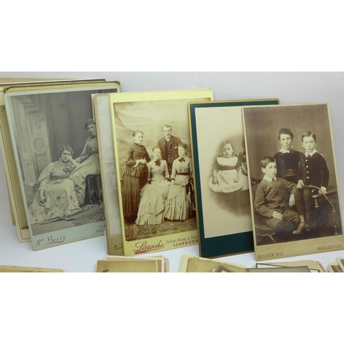 676 - A collection of over 100 Victorian cabinet cards and CDV's