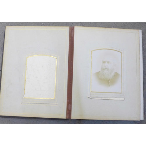 688 - An album of Victorian photographs and cabinet cards (48)