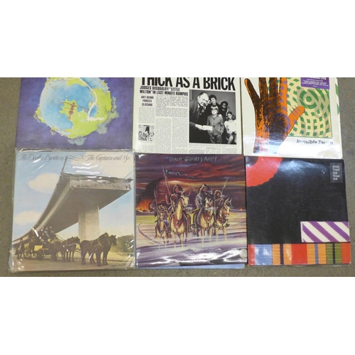 697 - A collection of twelve LP records, Pink Floyd Dark Side of the Moon, The Nice, Genesis, Yes, ELP, et... 