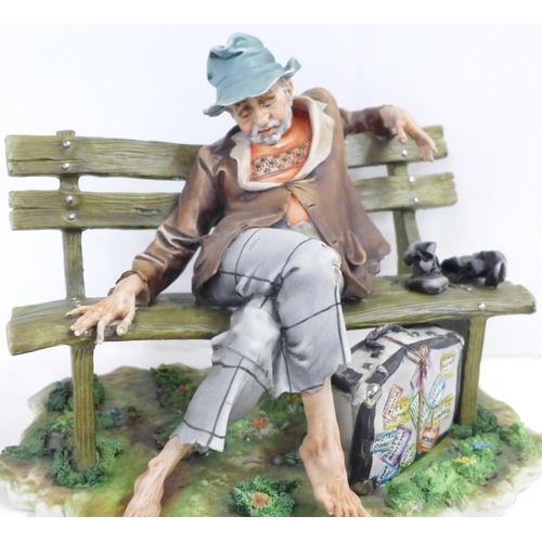 708 - A Capodimonte figure, Tramp on Bench, signed with certificate