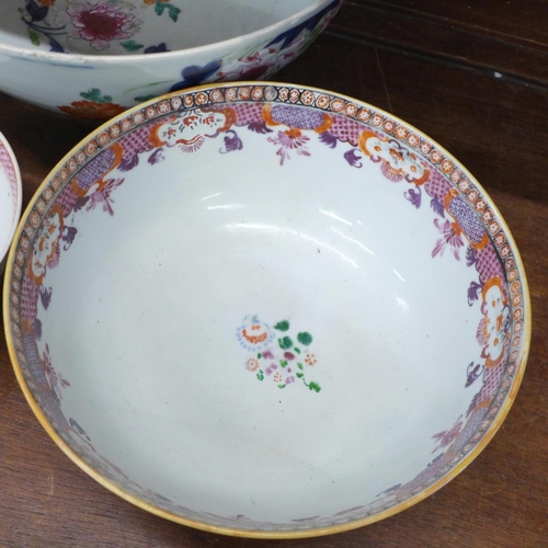 720 - An 18th Century Chinese export famille rose punch bowl, painted in under glaze cobalt blue and over ... 