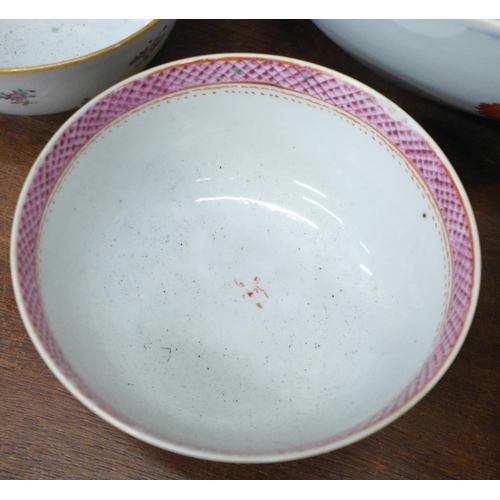 720 - An 18th Century Chinese export famille rose punch bowl, painted in under glaze cobalt blue and over ... 