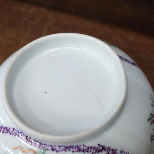 720 - An 18th Century Chinese export famille rose punch bowl, painted in under glaze cobalt blue and over ... 