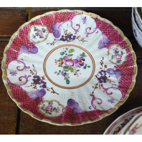 721 - A collection of Chinese famille rose export porcelain teacups and saucers, 18th/19th Century, twenty... 