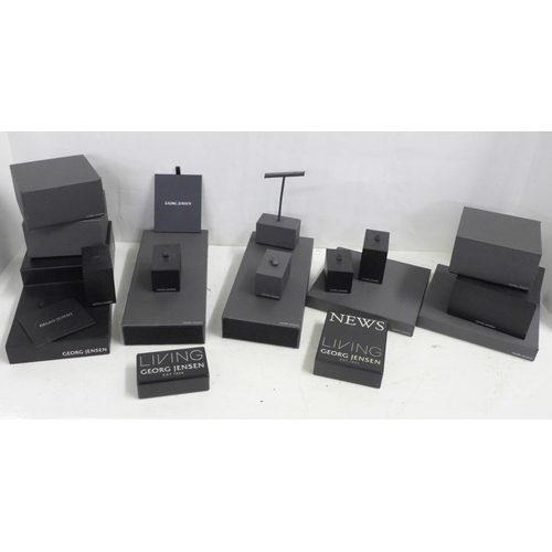 732 - A box of Georg Jensen jewellery display stands