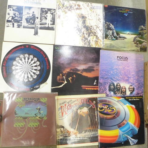 759 - A collection of ten LP records; Pink Floyd's The Wall (1st pressing), Yes x2, ELO, Genesis, etc.